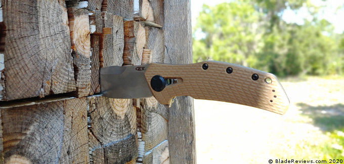 The Zero Tolerance 0308 Stabbed into some Wood